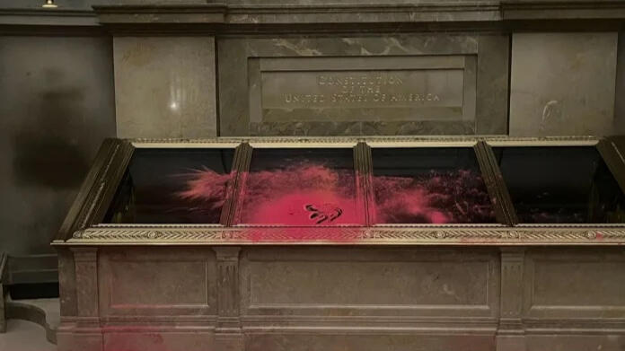 TWO CHARGED IN CONSTITUTION VANDALISM